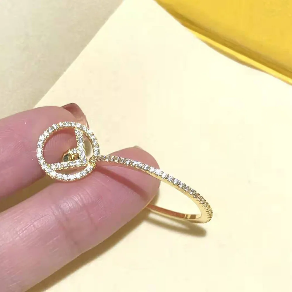 Fendi F is Fendi Earring Gold for Women in color Fendi F is Fendi Earring Gold for Women in color