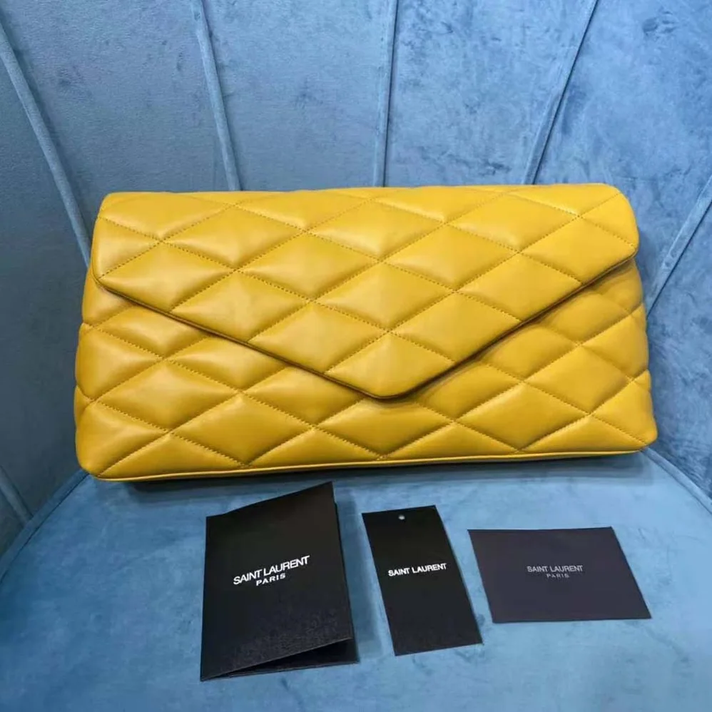Saint Laurent YSL Sade Puffer Envelope Clutch in Lambskin for Women in Yellow Saint Laurent YSL Sade Puffer Envelope Clutch in Lambskin for Women in Yellow