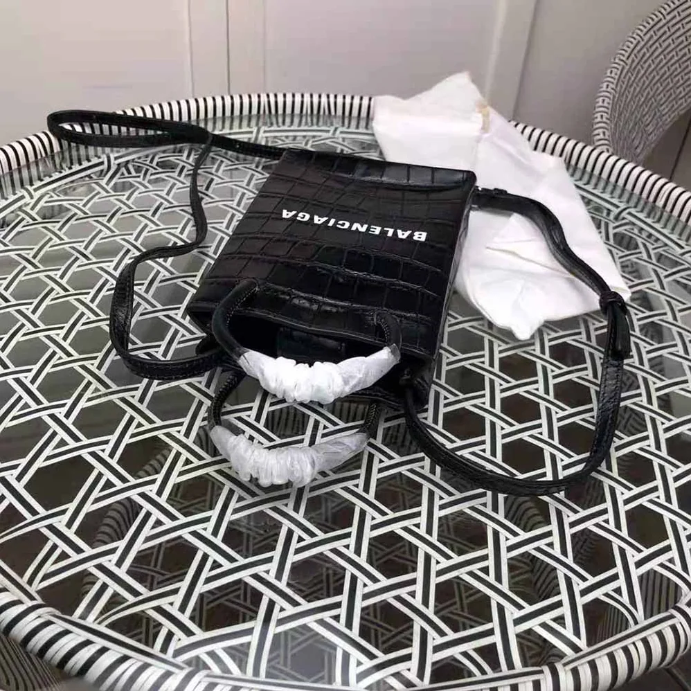 Balenciaga Shopping Phone Holder Shopping Phone Holder in Black Crocodile Embossed Calfskin for Unisex Balenciaga Shopping Phone Holder Shopping Phone Holder in Black Crocodile Embossed Calfskin for Unisex