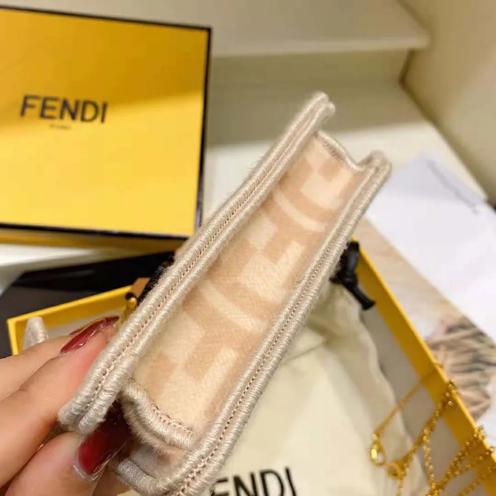 Fendi Nano Peekaboo Charm Beige Wool Charm for Women in Pink Fendi Nano Peekaboo Charm Beige Wool Charm for Women in Pink