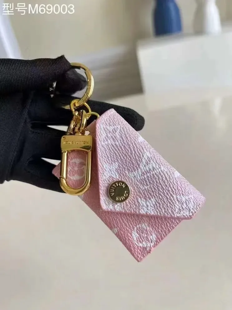 Louis Vuitton Kirigami Pouch Bag Charm And Key Holder Monogram Canvas Pink