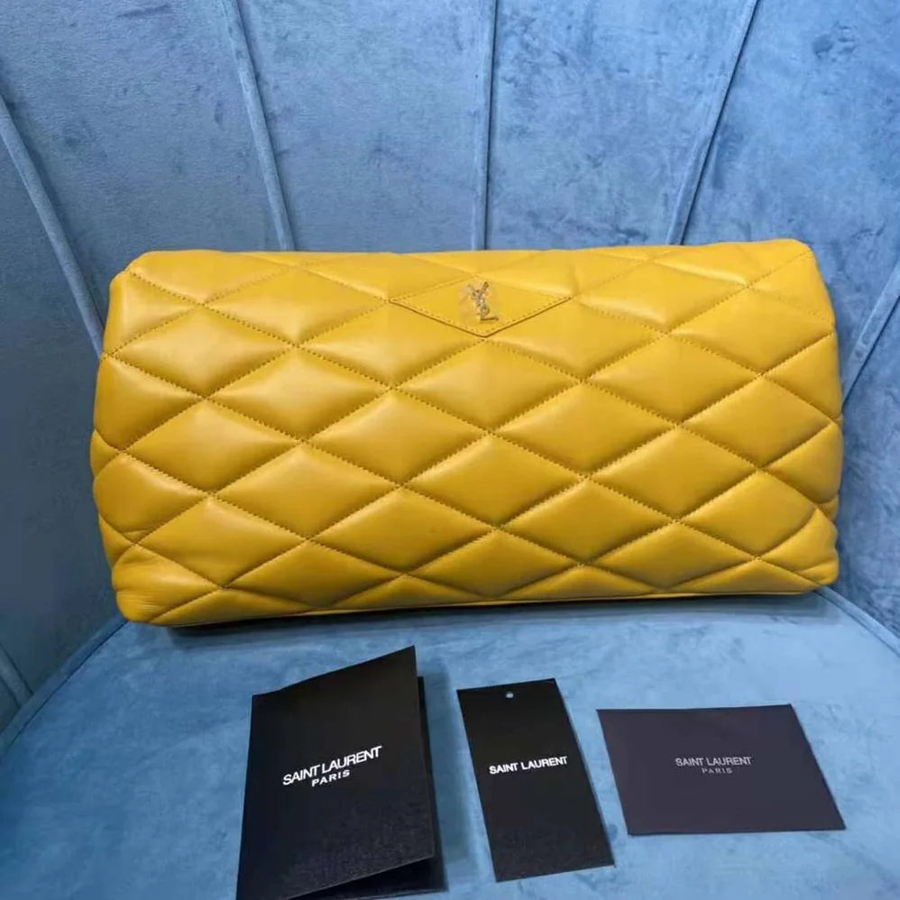 Saint Laurent YSL Sade Puffer Envelope Clutch in Lambskin for Women in Yellow Saint Laurent YSL Sade Puffer Envelope Clutch in Lambskin for Women in Yellow