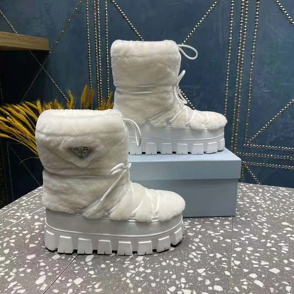 Prada Shearling Apres-ski Boots for Women in White