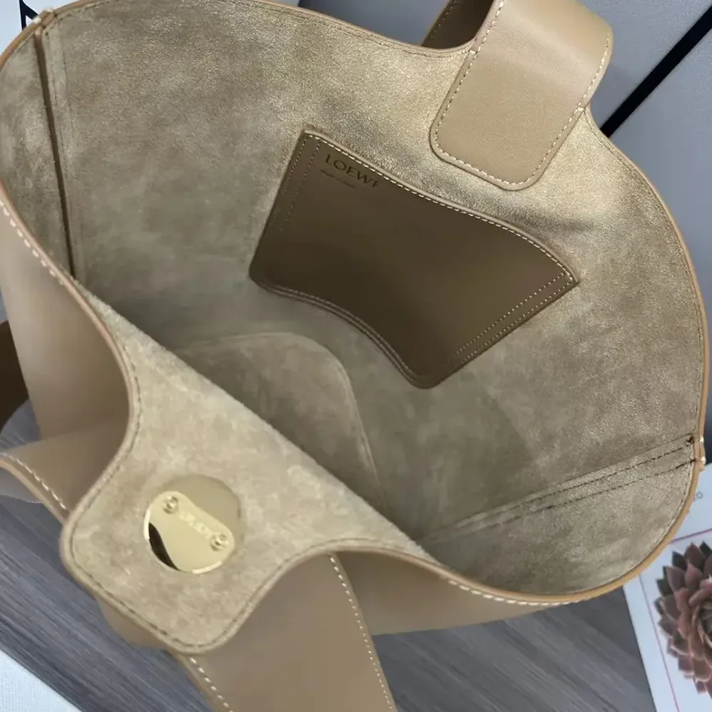 Loewe Mini Pebble Bucket Bag in Soft Grained Calfskin for Unisex in Sandy Loewe Mini Pebble Bucket Bag in Soft Grained Calfskin for Unisex in Sandy