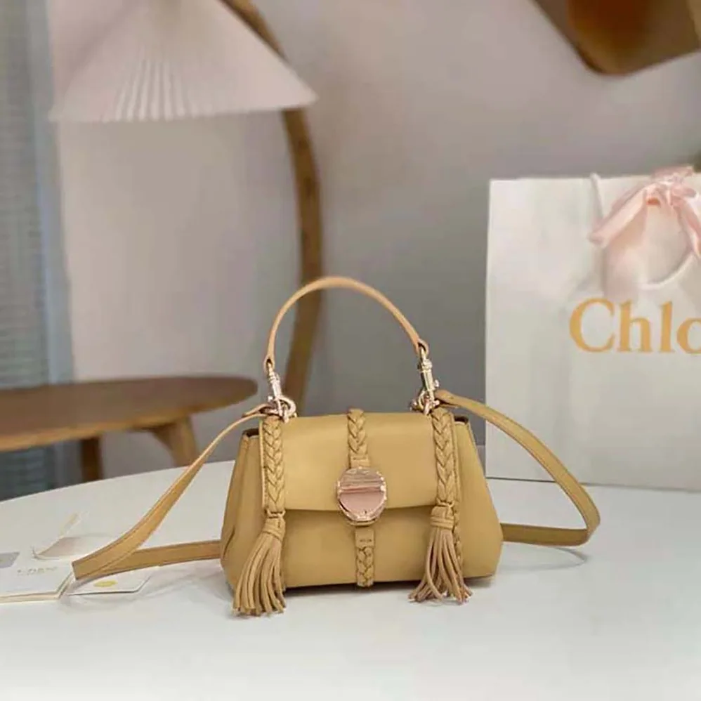 Chloé Penelope Mini Soft Shoulder Bag for Women in Brown