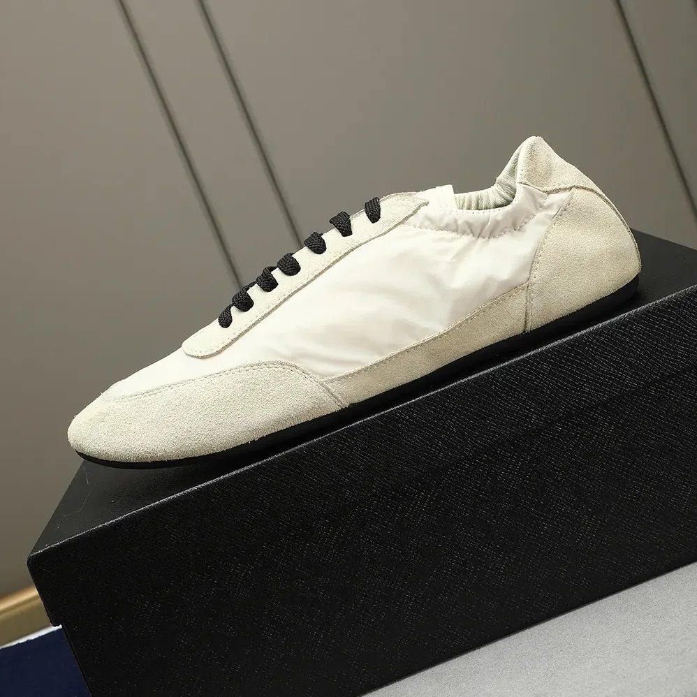 Prada Collapse Re-Nylon and Suede Elasticized Sneakers for Unisex in Ivory Prada Collapse Re-Nylon and Suede Elasticized Sneakers for Unisex in Ivory