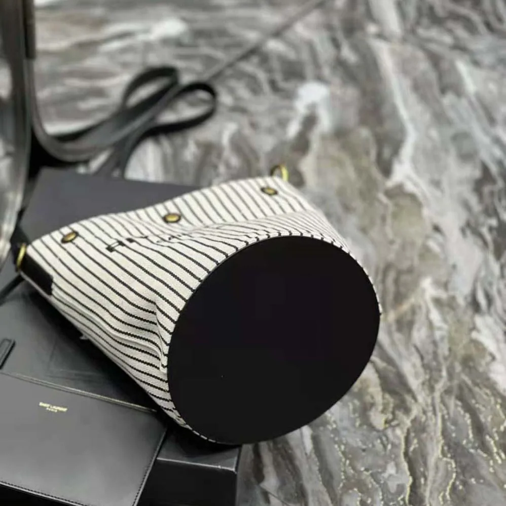 Saint Laurent YSL Rive Gauche Bucket Bag in Striped Canvas and Leather for Women Saint Laurent YSL Rive Gauche Bucket Bag in Striped Canvas and Leather for Women