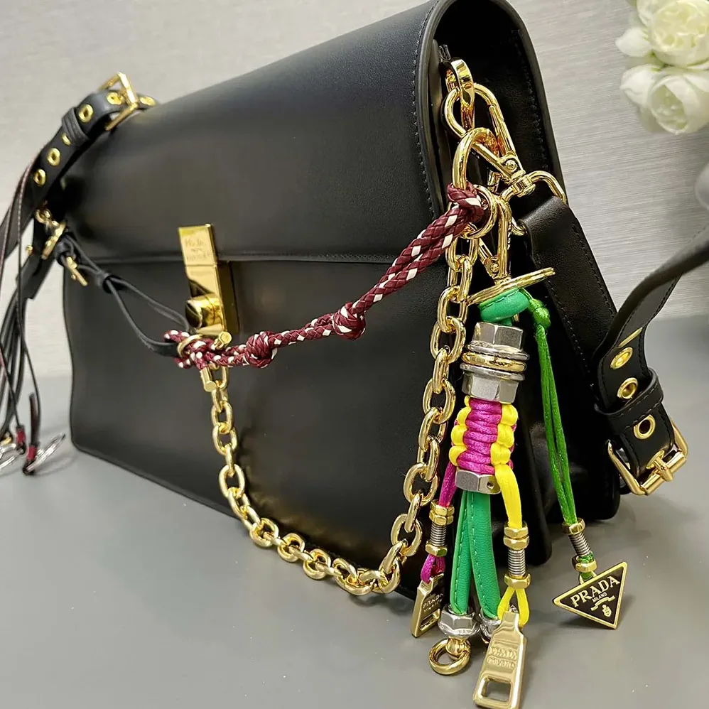 Prada Soft Sound Large Leather Shoulder Bag with Charms for Women in Black