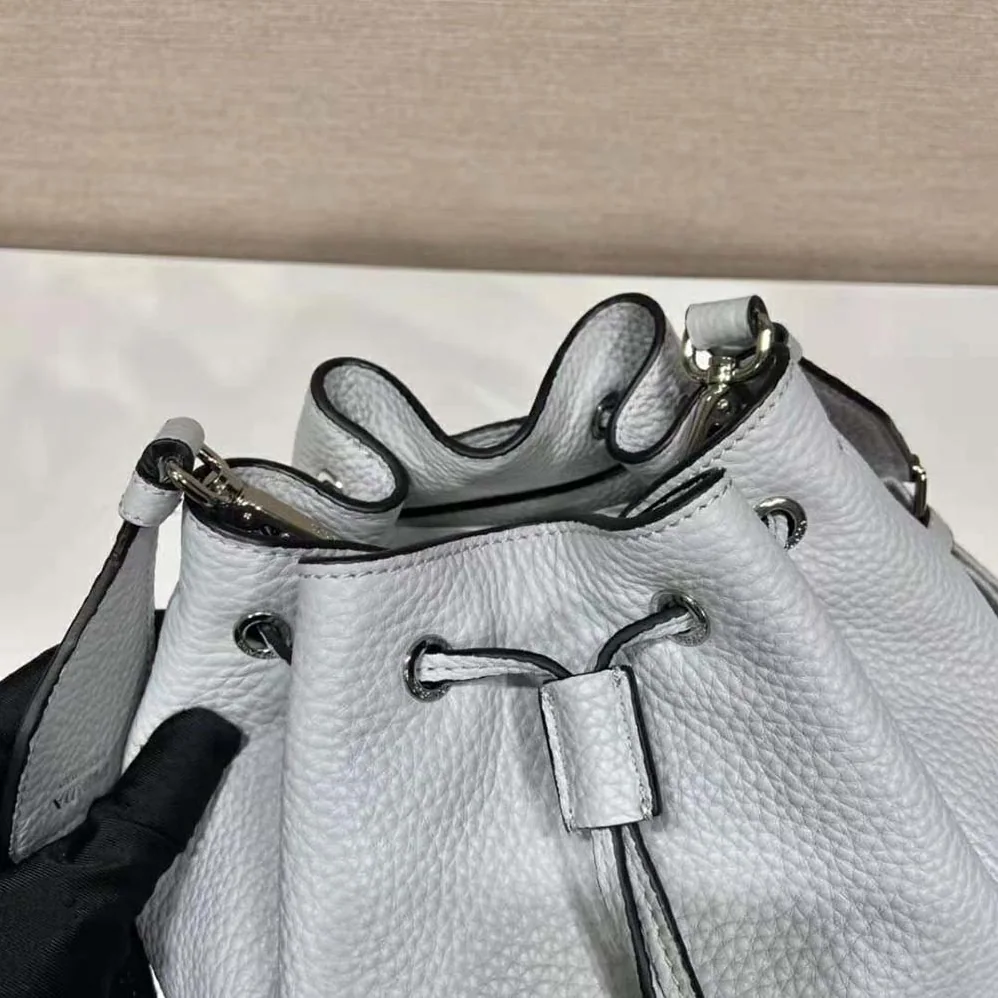 Prada Leather Bucket Bag with A Soft Silhouette for Women in Blue Prada Leather Bucket Bag with A Soft Silhouette for Women in Blue