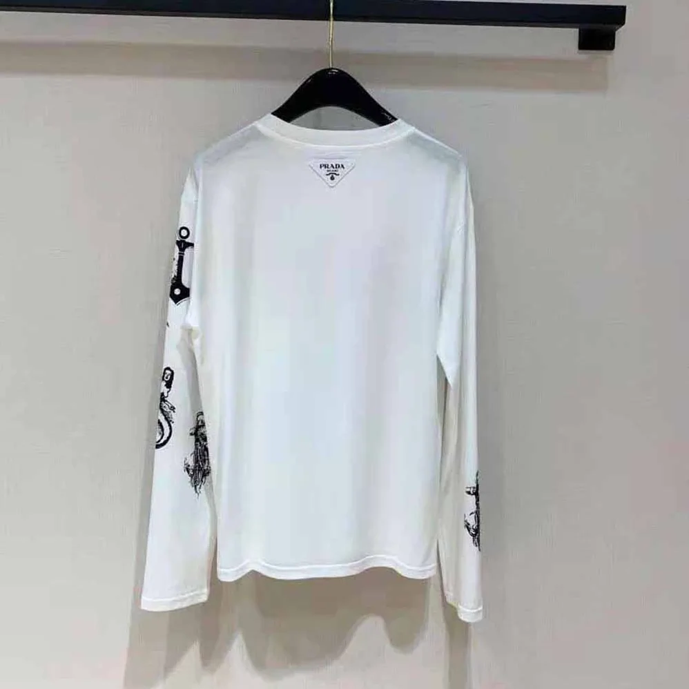 Prada Printed Cotton T-shirt with the Lettering Logo for Women in White Prada Printed Cotton T-shirt with the Lettering Logo for Women in White