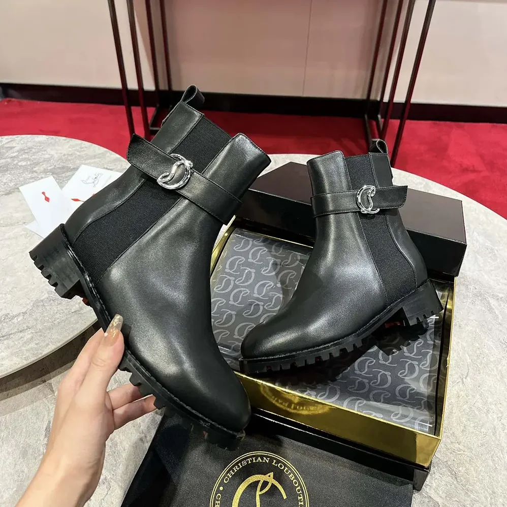 Christian Louboutin CL Chelsea Booty Lug Low Boots Calf Leather for Women in Black