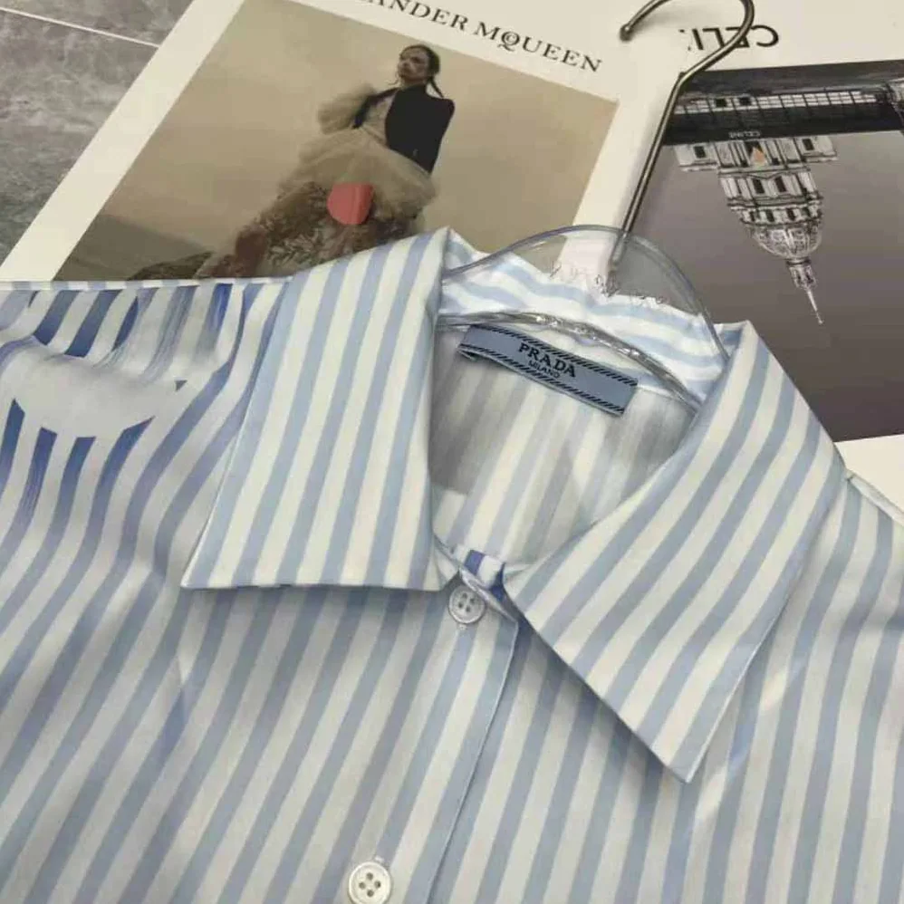 Prada Sleeveless Printed Poplin Shirt for Women in Blue Prada Sleeveless Printed Poplin Shirt for Women in Blue