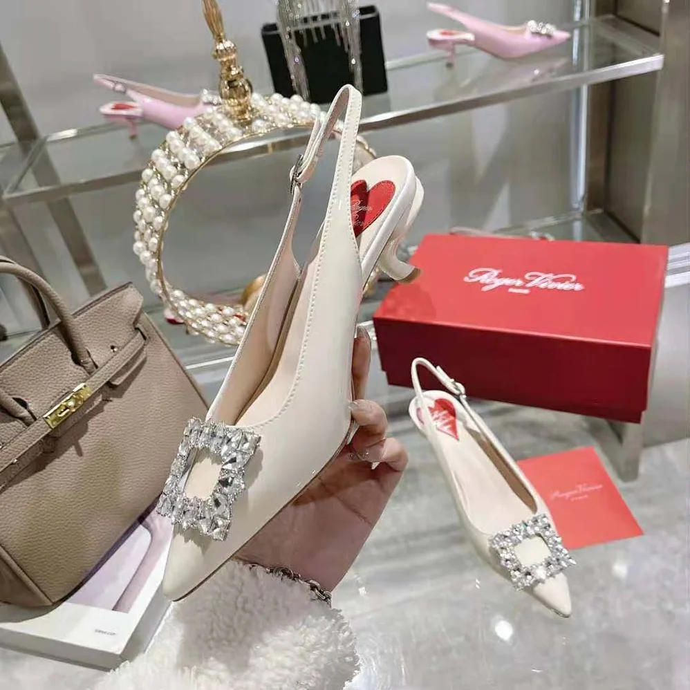 Roger Vivier Virgule Strass Buckle Slingback Pumps in Patent Leather for Women in White Roger Vivier Virgule Strass Buckle Slingback Pumps in Patent Leather for Women in White