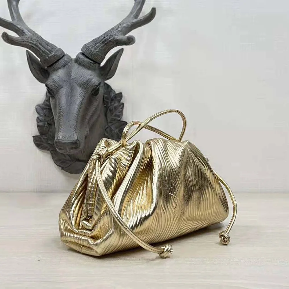 Bottega Veneta Pouch Metalized Leather Clutch for Women in Gold