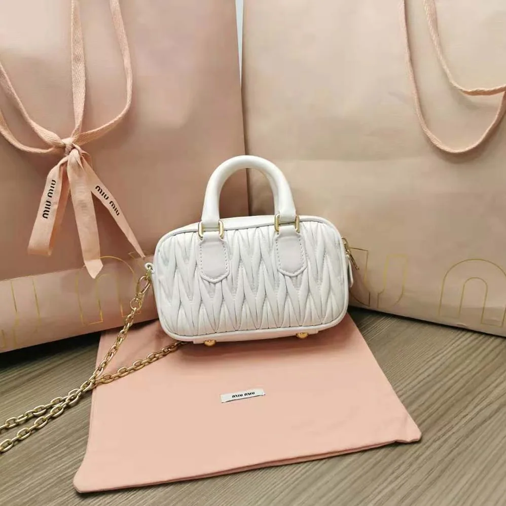 Miu Miu Matelassé Nappa Leather Top-Handle Mini-Bag for Women in White Miu Miu Matelassé Nappa Leather Top-Handle Mini-Bag for Women in White