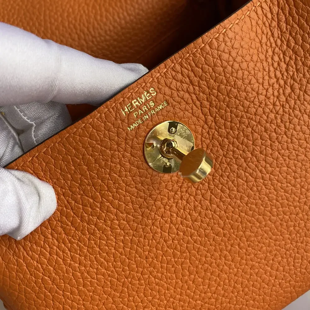 Hermes Lindy Mini 19 in Clemence Leather for Women in Orange/Gold Hermes Lindy Mini 19 in Clemence Leather for Women in Orange/Gold