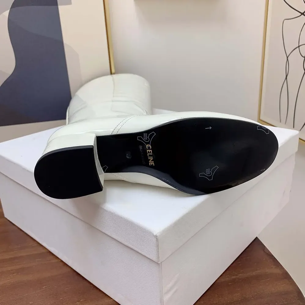 Celine Les Bottes Celine Triomphe High Boot in Patent Calfskin for Women in White