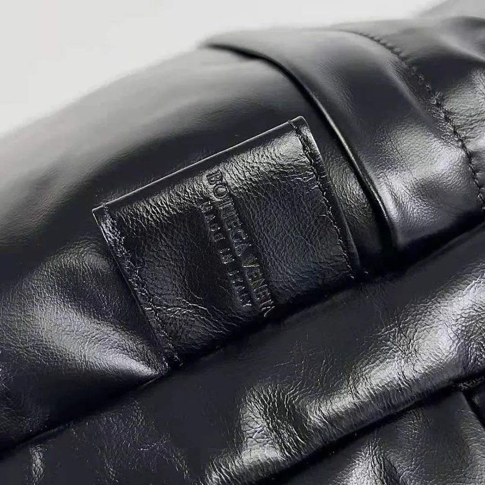 Bottega Veneta Medium Archetype Backpack Crafted from Supple Lambskin Leather for Men in Black