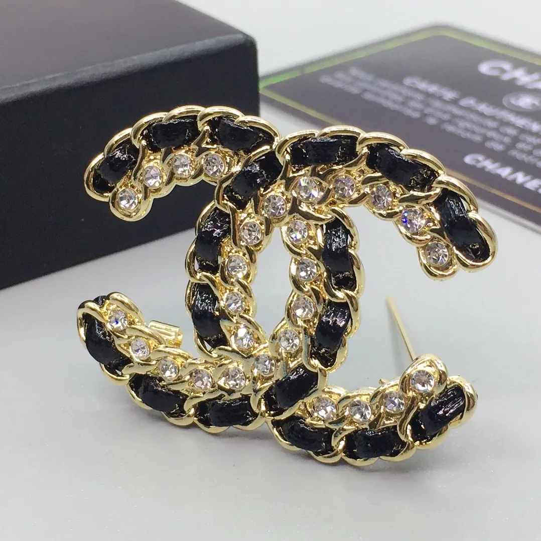 Chanel Brooch CC Logo Gold in toned