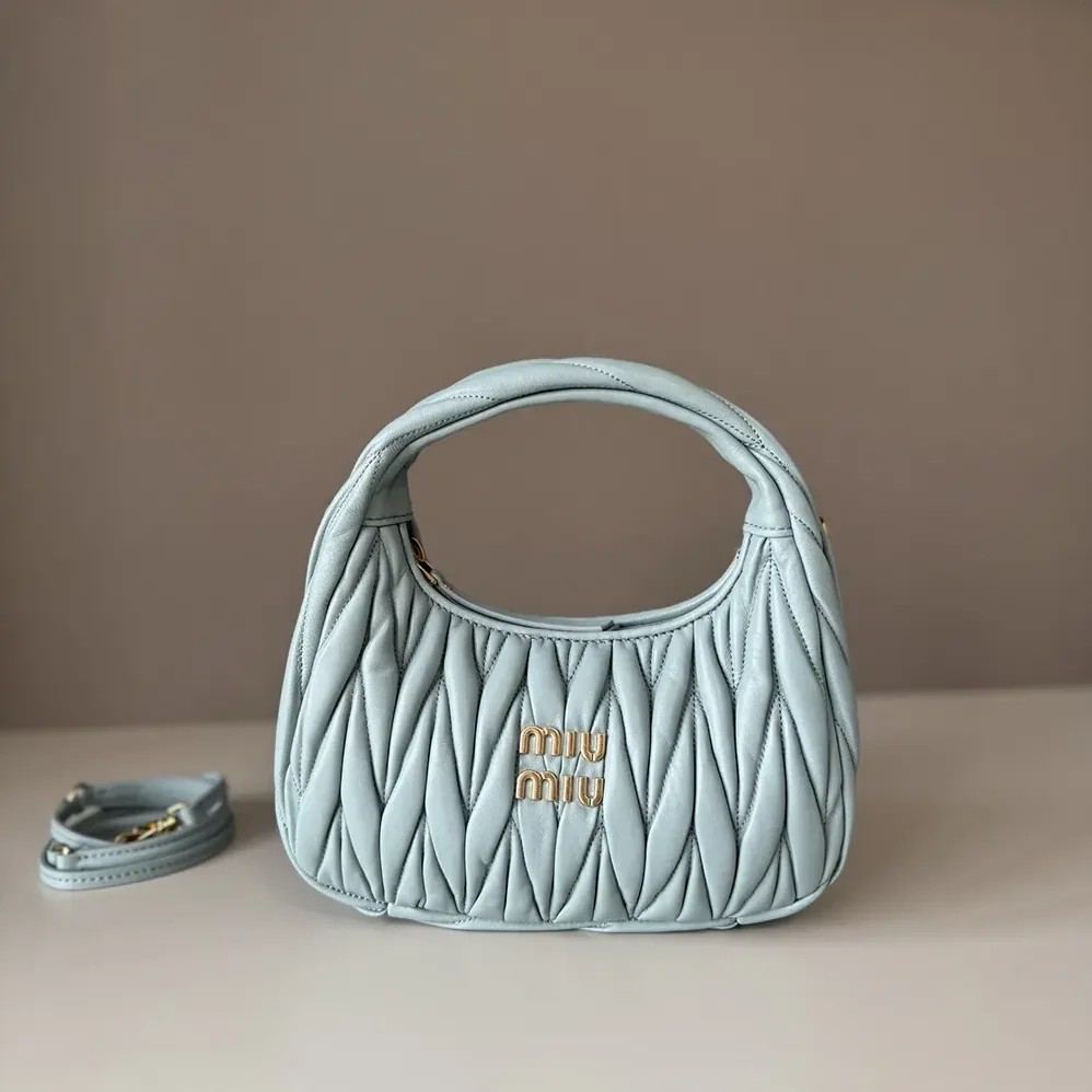 Miu Miu Wander Matelassé Nappa Leather Hobo Bag for Women in Powder Blue Miu Miu Wander Matelassé Nappa Leather Hobo Bag for Women in Powder Blue