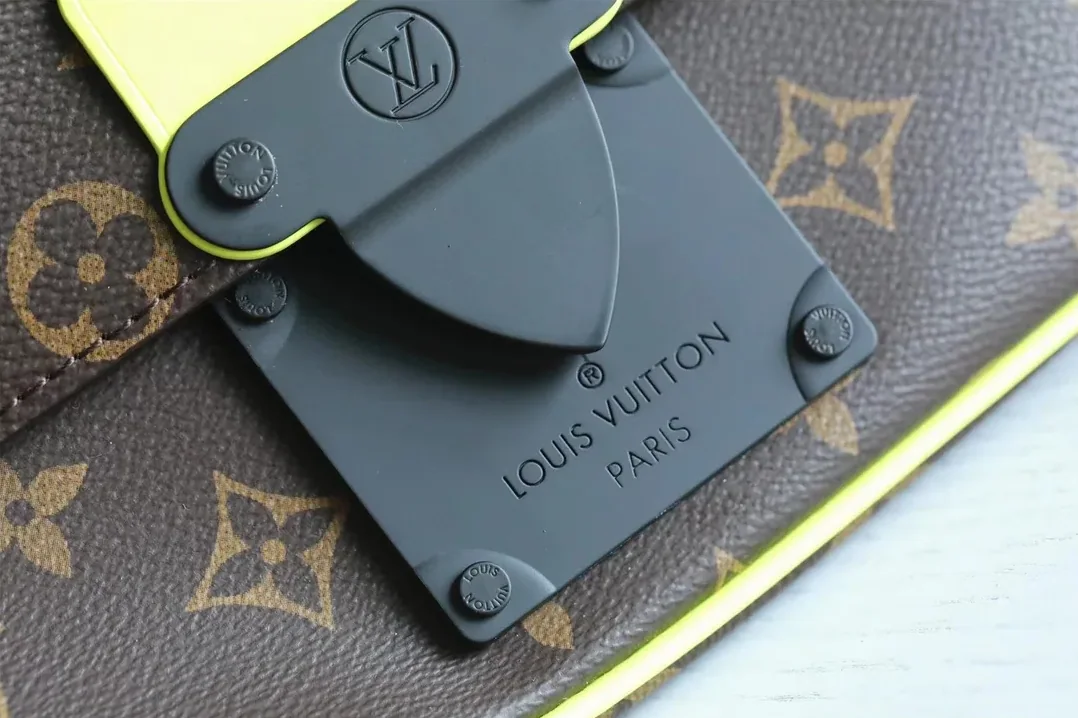 Louis Vuitton S-Lock Sling Monogram Macassar Yellow Louis Vuitton S-Lock Sling Monogram Macassar Yellow