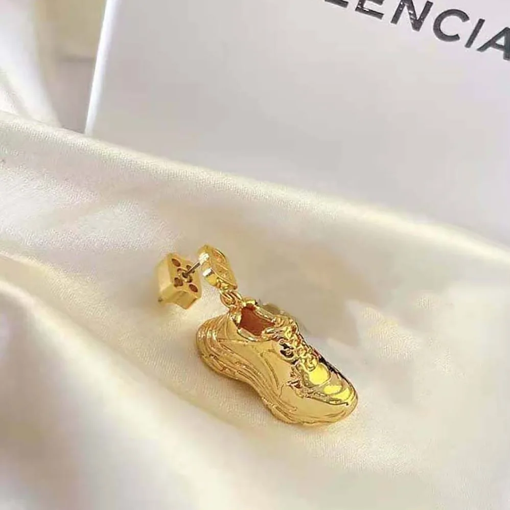 Balenciaga Mini Triple S Earring in Gold Bronze and Brass for Women Balenciaga Mini Triple S Earring in Gold Bronze and Brass for Women