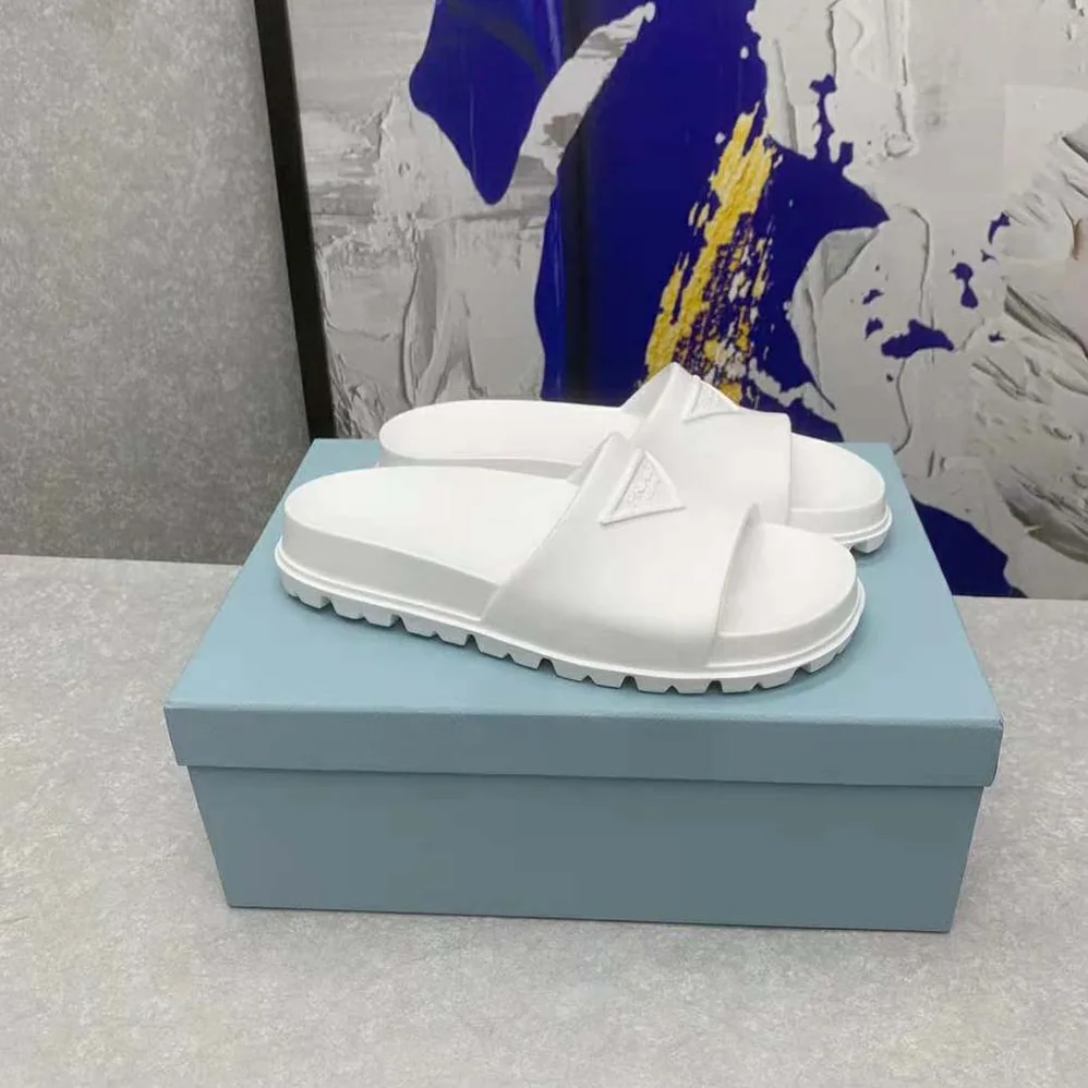 Prada Rubber Slides In 20 mm Heel Height for Women in White Prada Rubber Slides In 20 mm Heel Height for Women in White