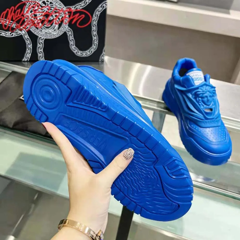 Versace Odissea Sneakers are Set on Rubber Soles with Perforated Toe Caps for Unisex in Blue Versace Odissea Sneakers are Set on Rubber Soles with Perforated Toe Caps for Unisex in Blue