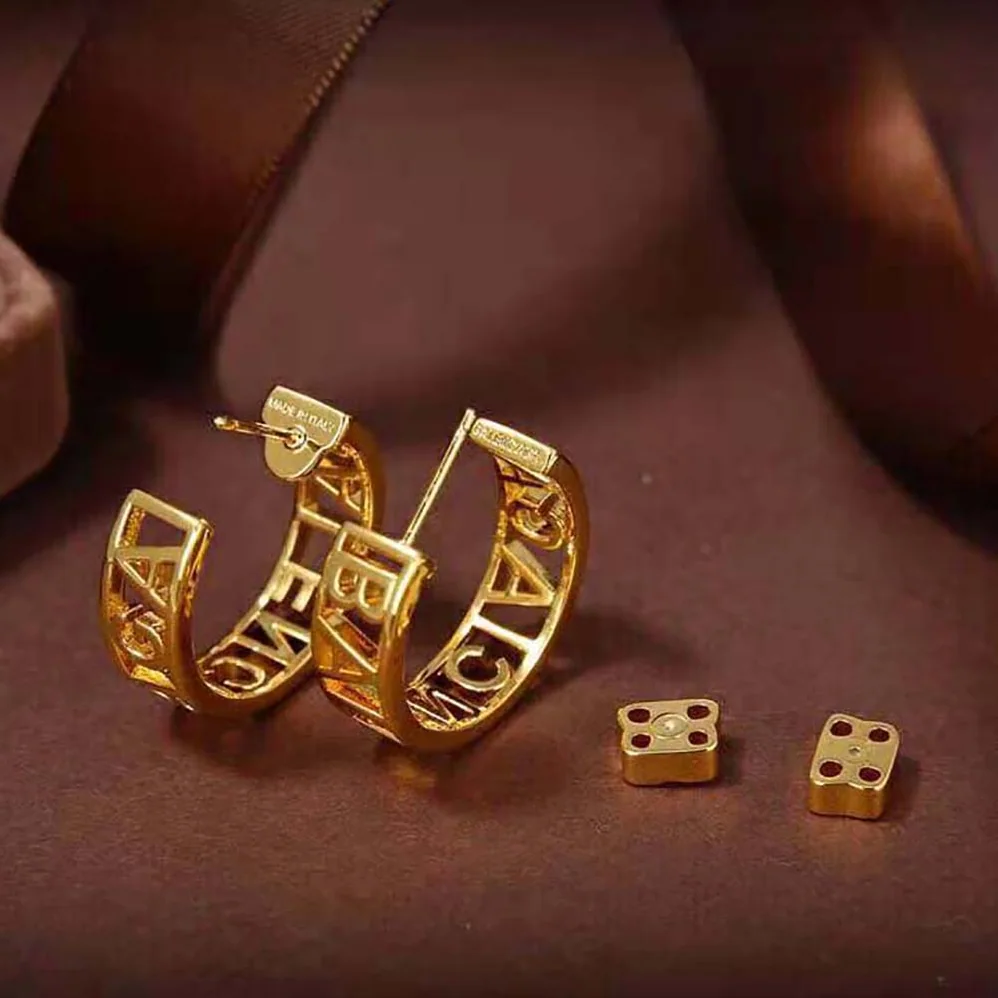 Balenciaga Logo Earrings in Gold Brass for Women