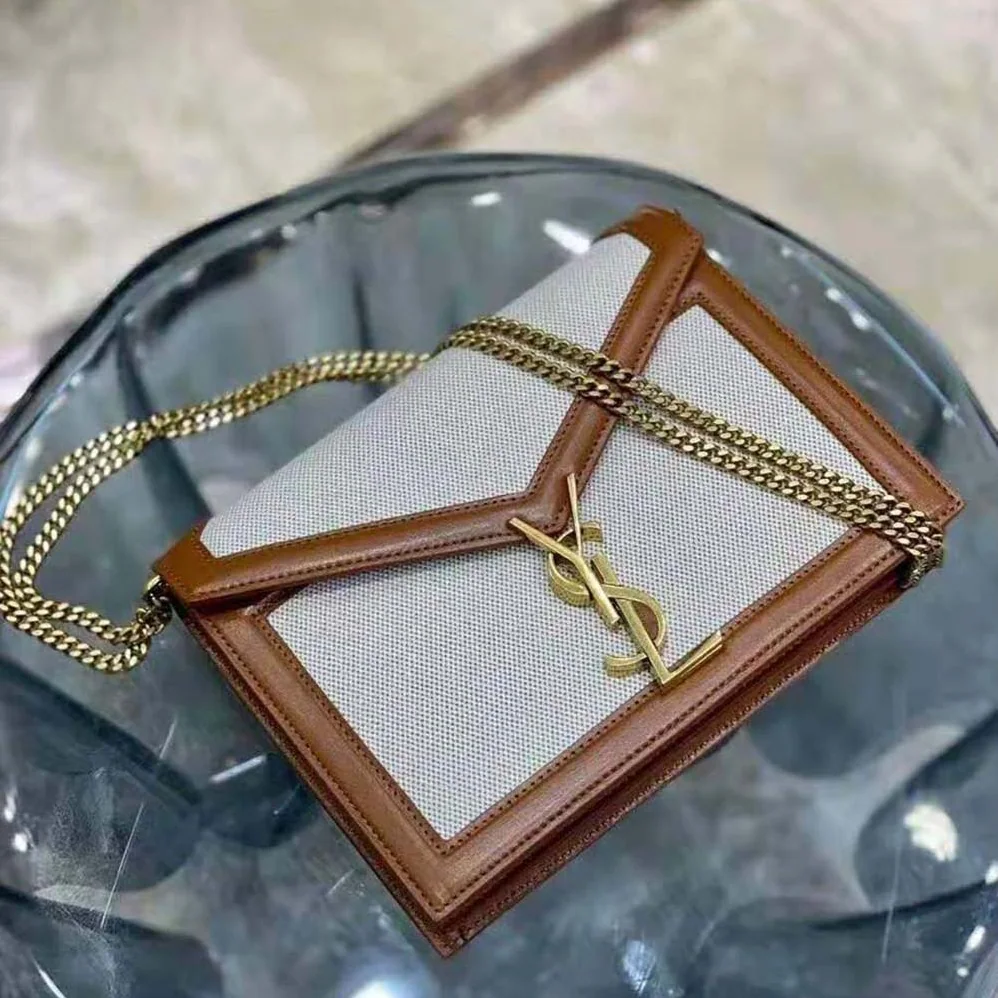 Saint Laurent YSL Cassandra Monogram Clasp Bag in Canvas and Smooth Leather for Women