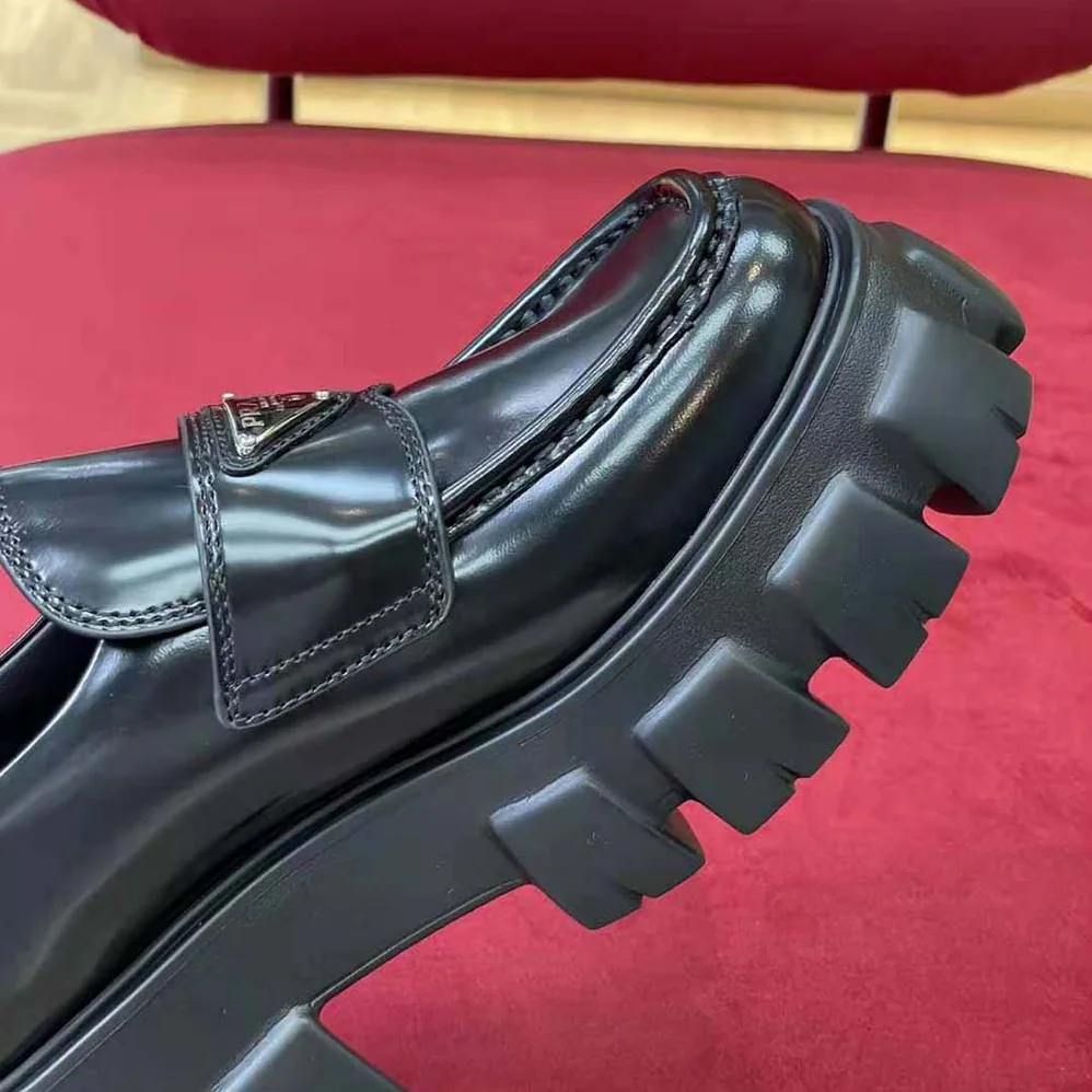 Prada Brushed Leather Monolith Loafers for Unisex in Black