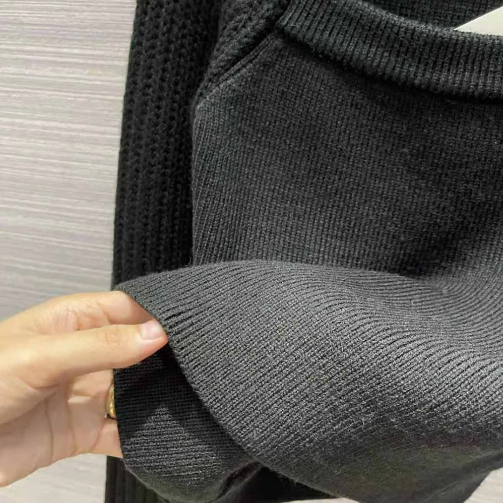 Loewe Cut Out Cropped Sweater in Wool for Women in Black Loewe Cut Out Cropped Sweater in Wool for Women in Black
