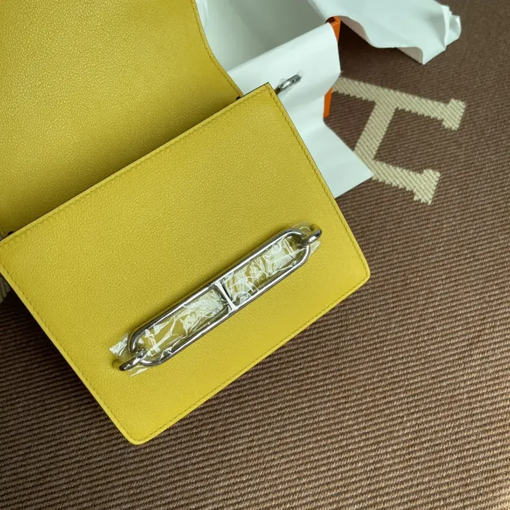 Hermes Roulis Mini Bag in Evercolor Calfskin for Women in Yellow/Gold Hermes Roulis Mini Bag in Evercolor Calfskin for Women in Yellow/Gold