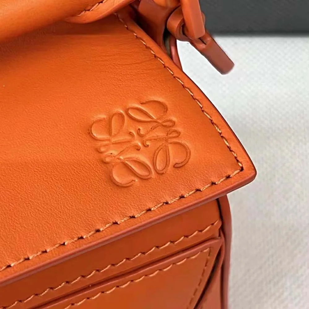 Loewe Mini Puzzle Bag in Satin Calfskin for Women in Orange Loewe Mini Puzzle Bag in Satin Calfskin for Women in Orange