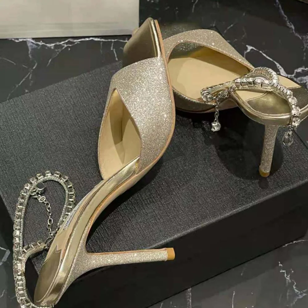 Jimmy Choo Saeda Sandal 100 Platinum Ice Dusty Glitter Sandals with Crystal Embellishment for Women Jimmy Choo Saeda Sandal 100 Platinum Ice Dusty Glitter Sandals with Crystal Embellishment for Women