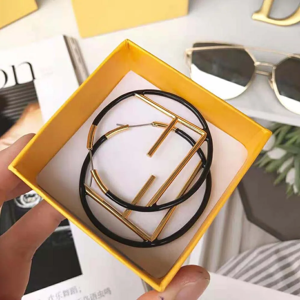 Fendi F is Fendi Earrings Gold Colored Earrings for Women in Black