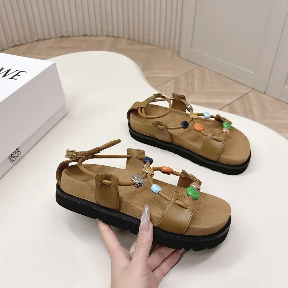 Loewe Pebble Beads Fussbett Sandal in Nappa Lambskin for Women in Camel Loewe Pebble Beads Fussbett Sandal in Nappa Lambskin for Women in Camel