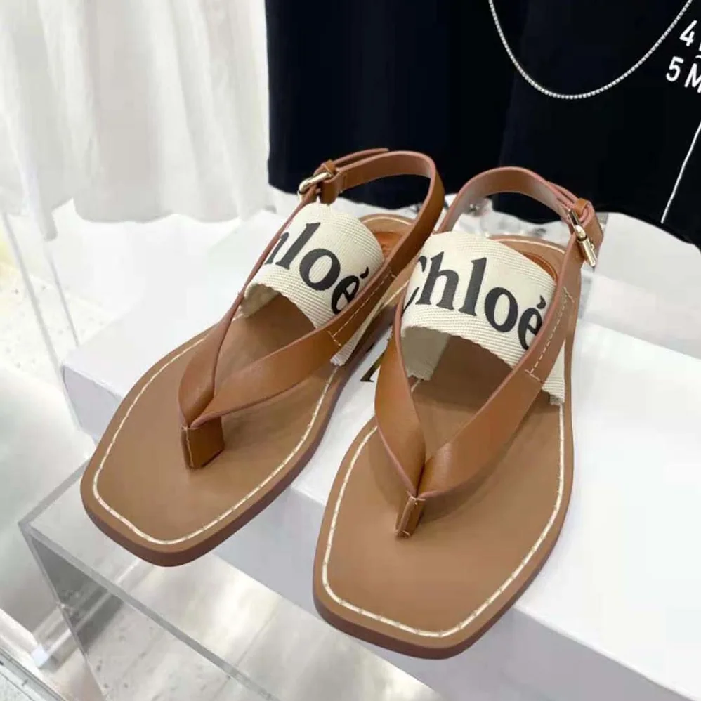 Chloe Woody Flat Sandal in Calfskin and Canvas for Women in White Chloe Woody Flat Sandal in Calfskin and Canvas for Women in White