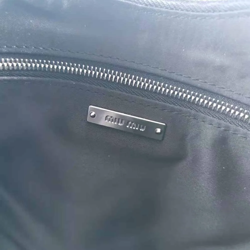Miu Miu Large Matelasse Nappa Leather Shoulder Bag for Women in Black Miu Miu Large Matelasse Nappa Leather Shoulder Bag for Women in Black
