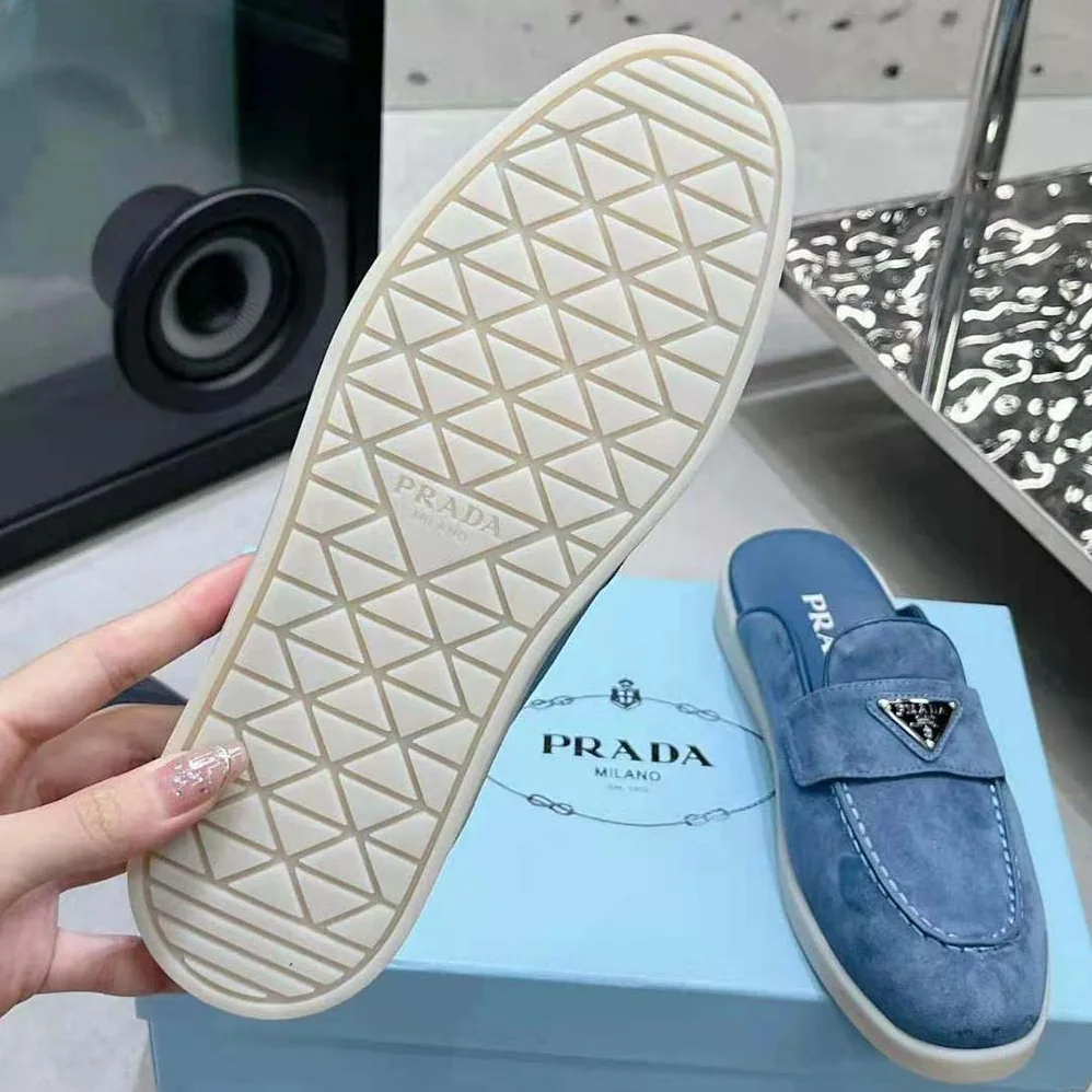 Prada Suede Sabots with the Enameled Metal Triangle Logo for Men