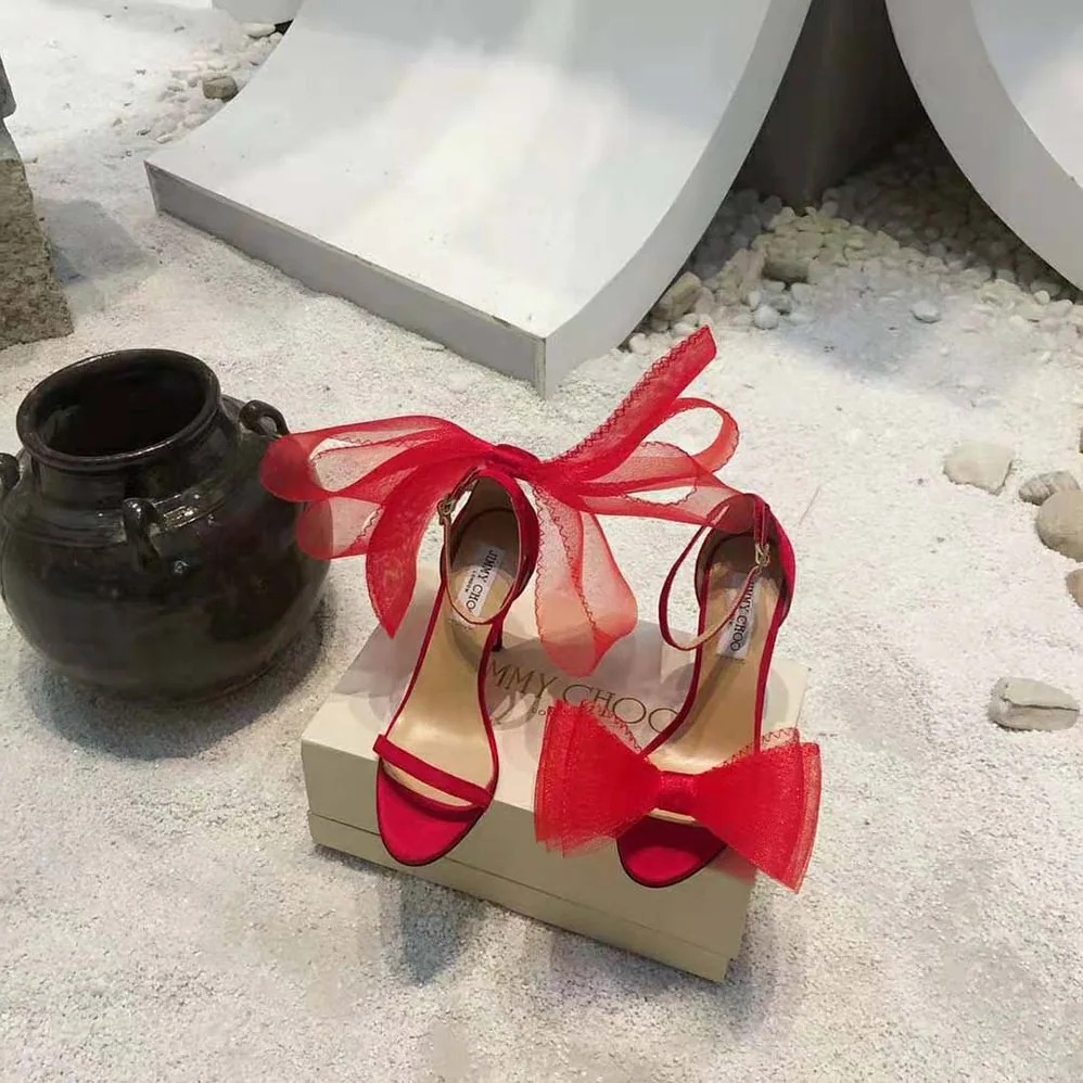 Jimmy Choo Aveline 100 Red Sandals with Asymmetric Grosgrain Mesh Fascinator Bows for Women Jimmy Choo Aveline 100 Red Sandals with Asymmetric Grosgrain Mesh Fascinator Bows for Women
