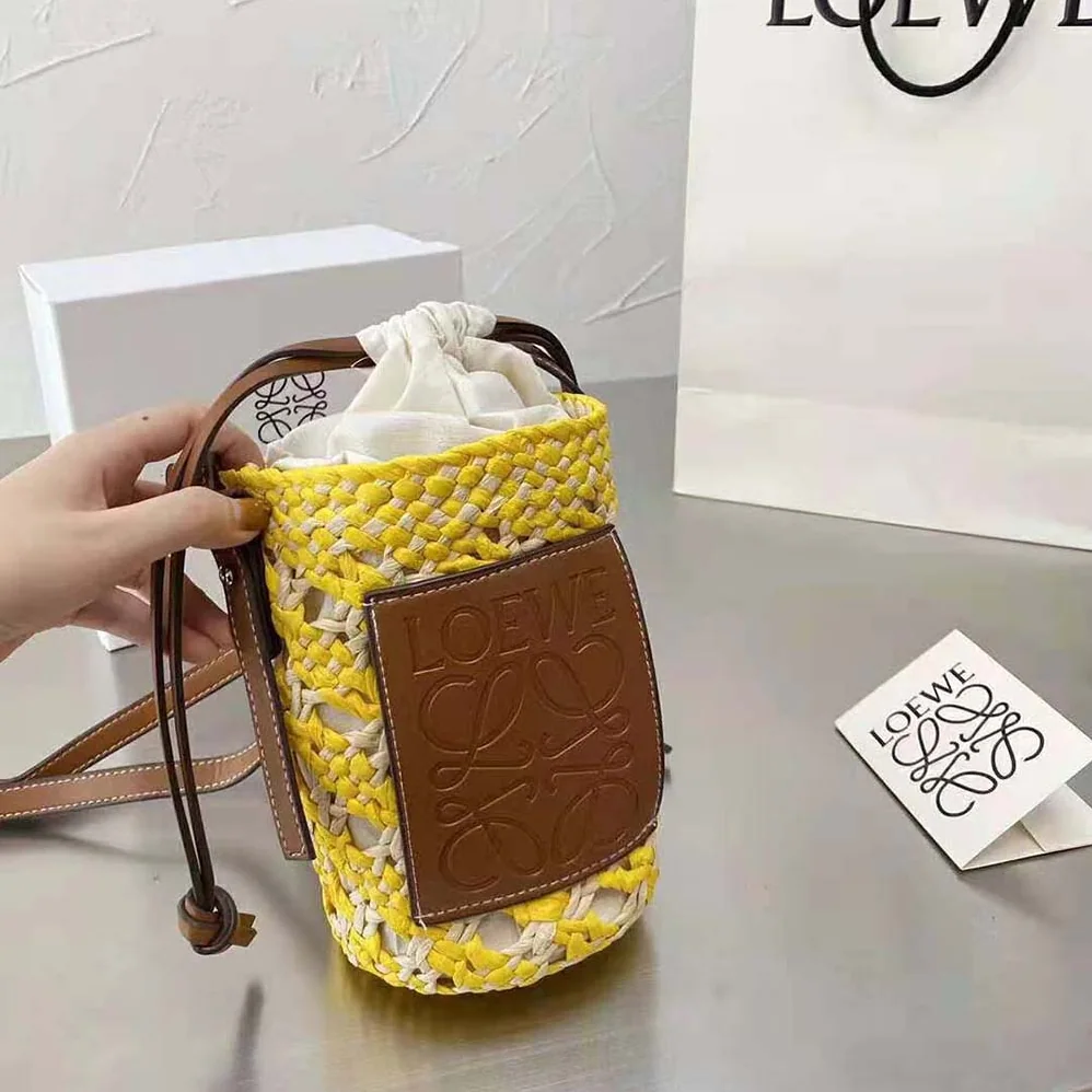 Loewe Cylinder Pocket in Iraca Palm and Calfskin for Women Loewe Cylinder Pocket in Iraca Palm and Calfskin for Women