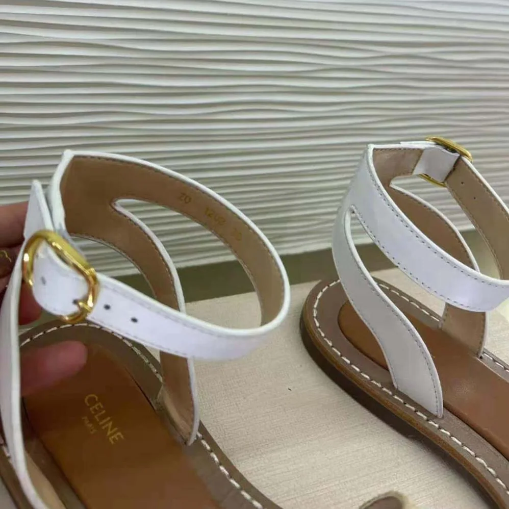 Celine Lympia Flat Strap Sandal in Raffia & Calfskin for Women in White Celine Lympia Flat Strap Sandal in Raffia & Calfskin for Women in White
