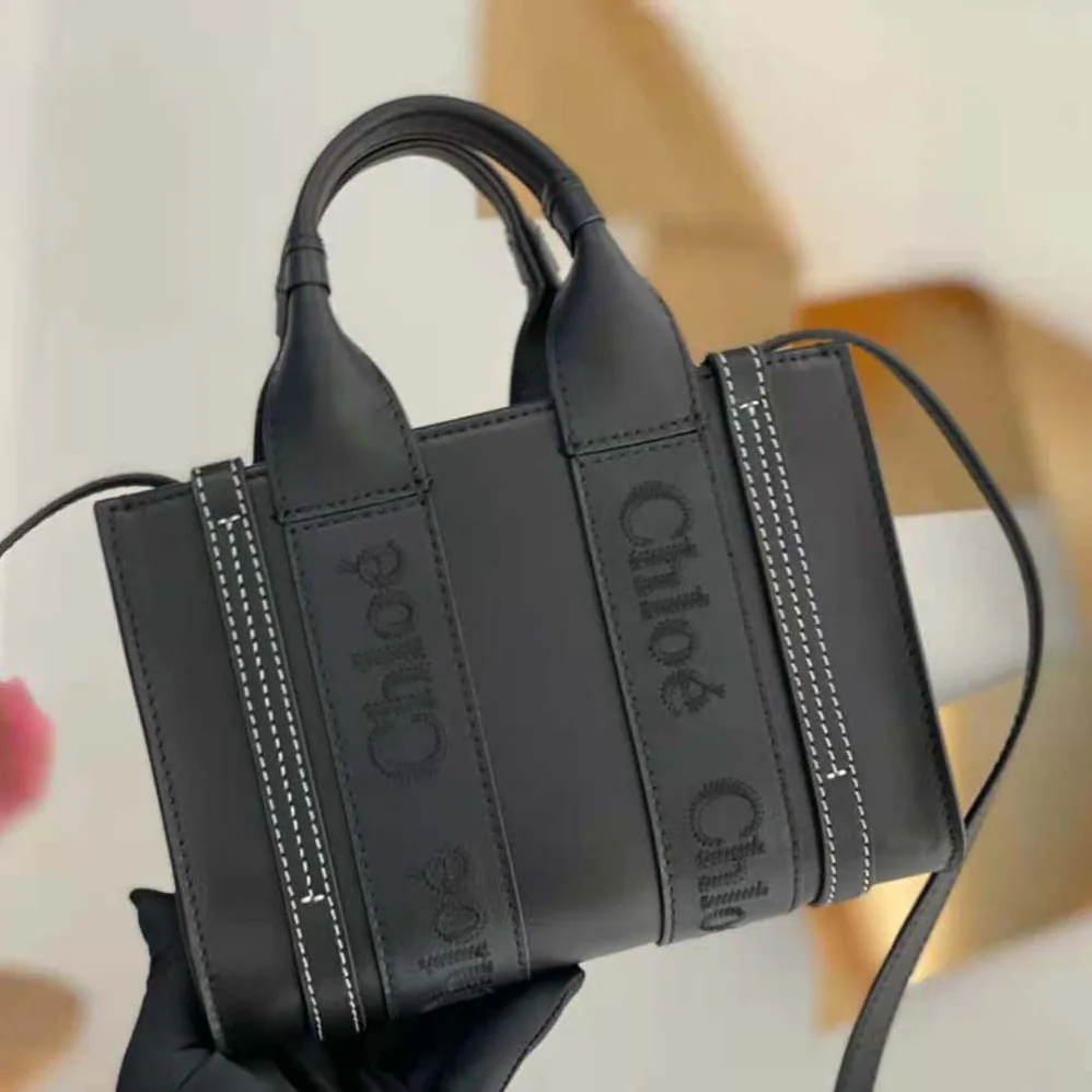 Chloe Mini Woody Tote Bag with Embroidered Chloé Logo for Women in Black Chloe Mini Woody Tote Bag with Embroidered Chloé Logo for Women in Black