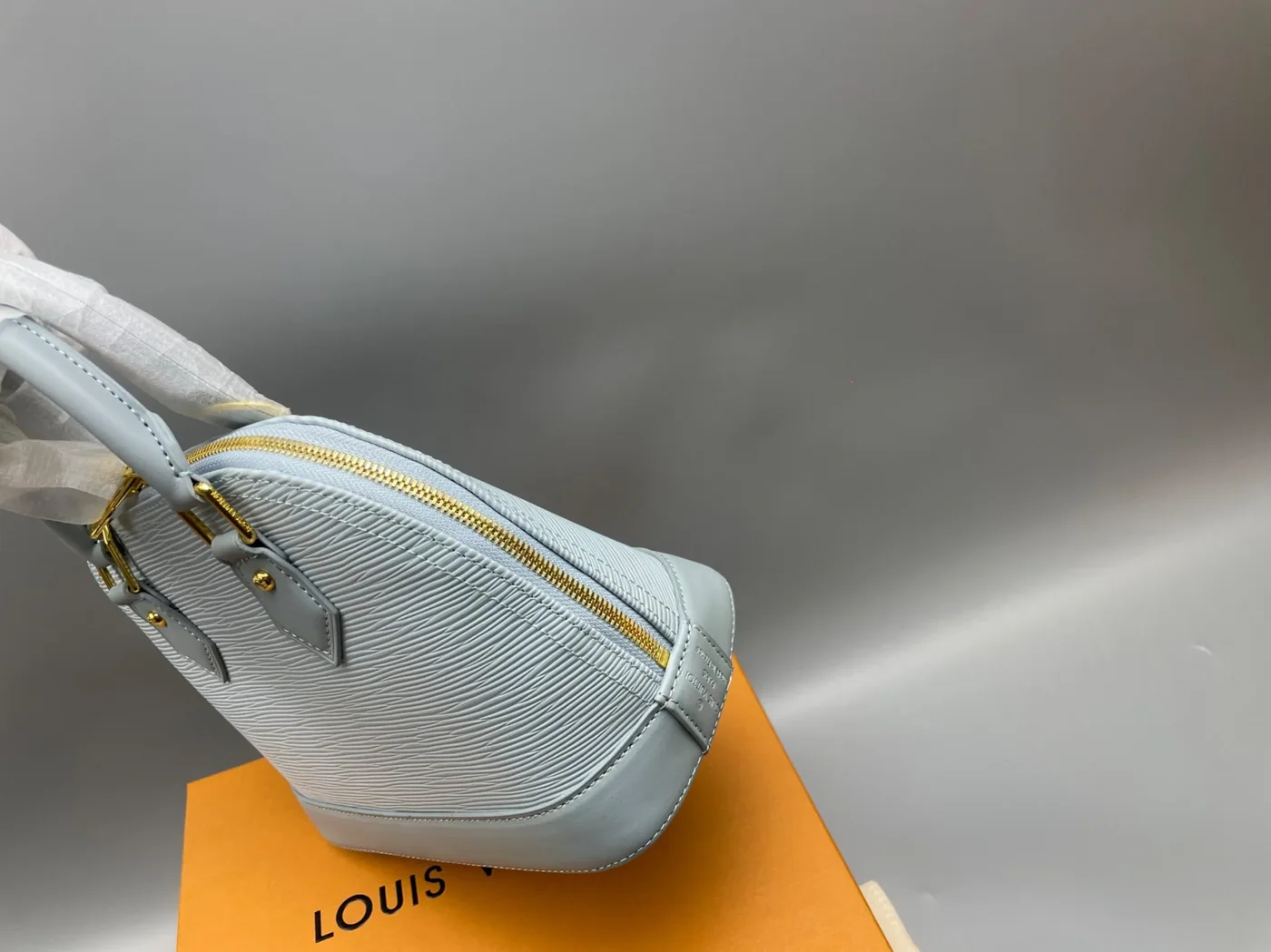 Louis Vuitton LV x TM Alma BB Top Handle Bag in Washed Blue Gold Hardware