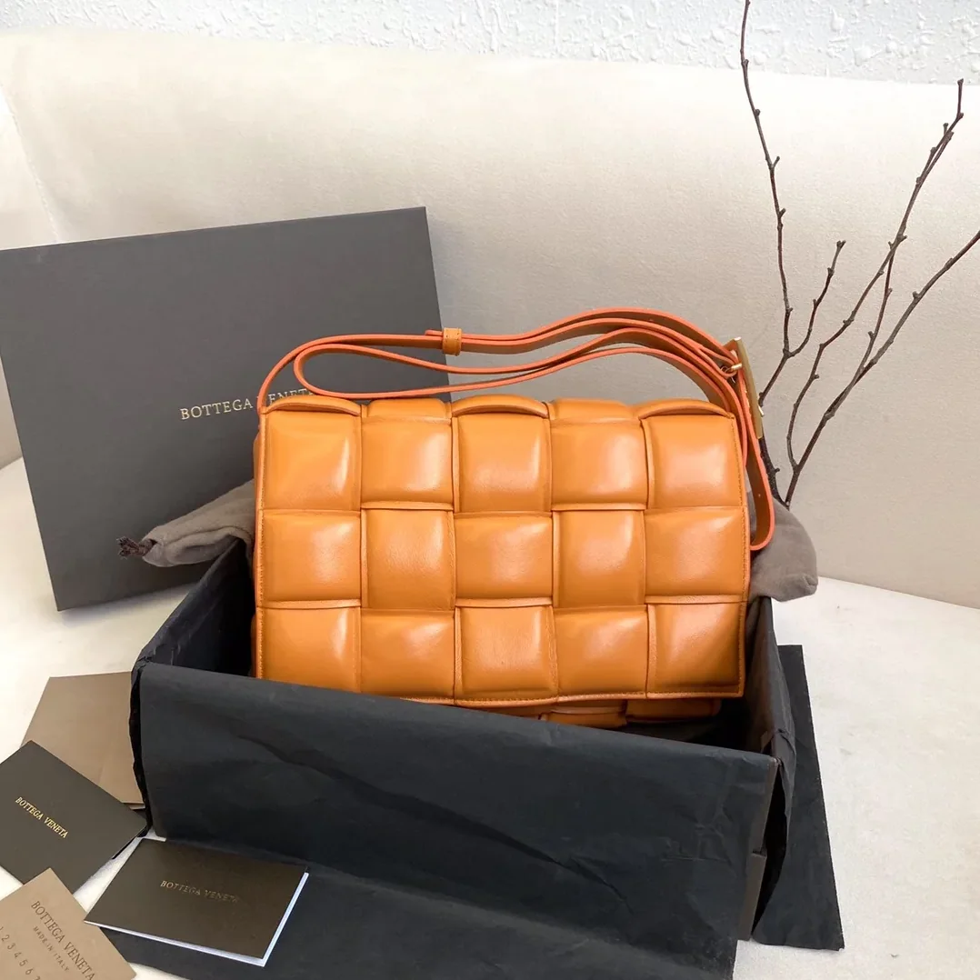 Bottega Veneta Padded Cassette Bag in In Orange