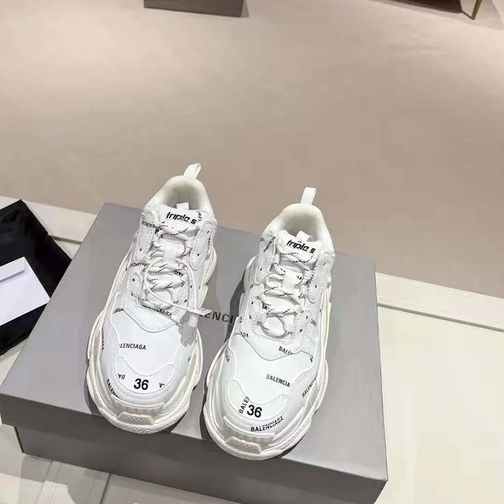 Balenciaga Triple S Sneaker Allover Logo in White and Black Technical Material for Unisex Balenciaga Triple S Sneaker Allover Logo in White and Black Technical Material for Unisex