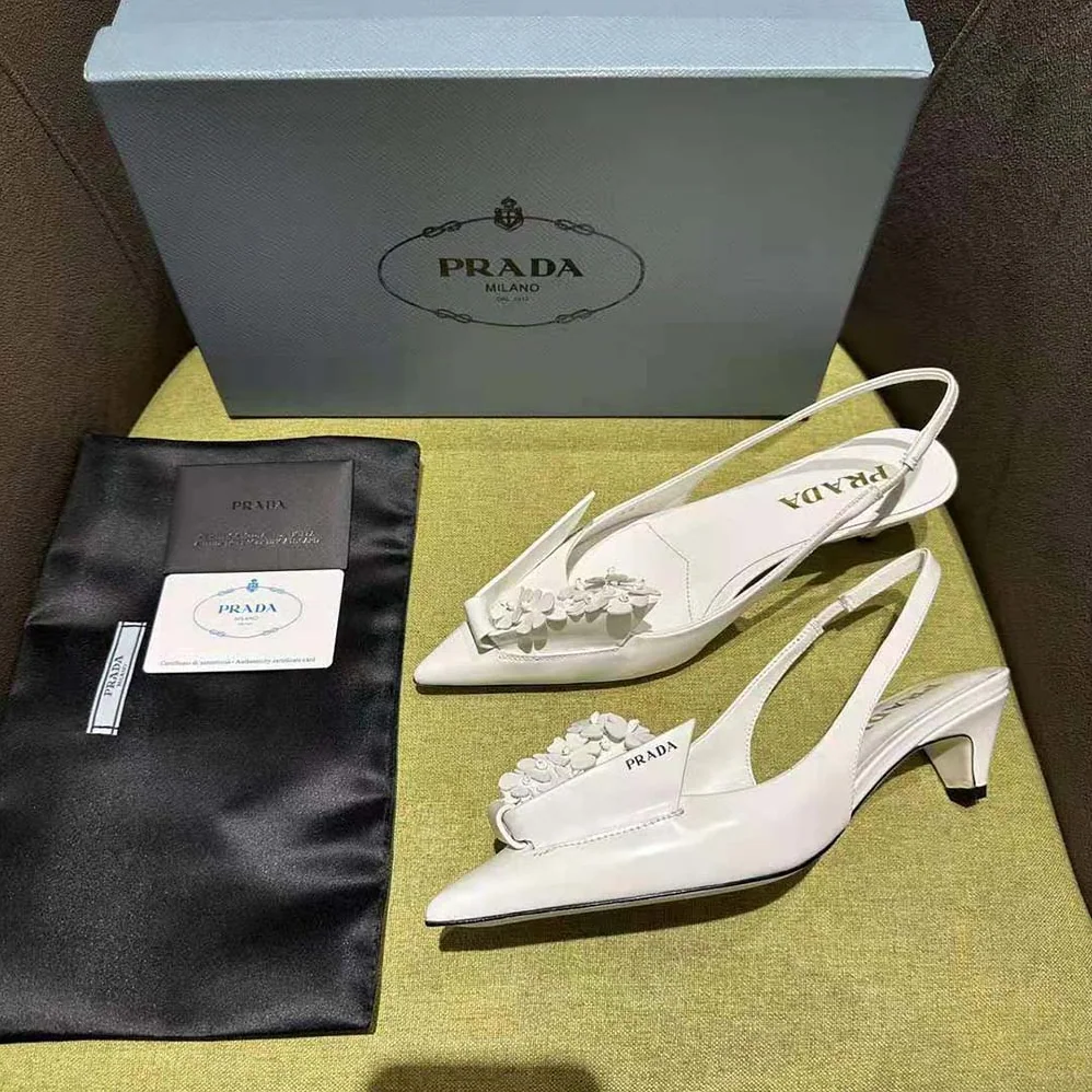Prada Brushed Leather Slingback Pumps with Floral Appliques for Women in White Prada Brushed Leather Slingback Pumps with Floral Appliques for Women in White