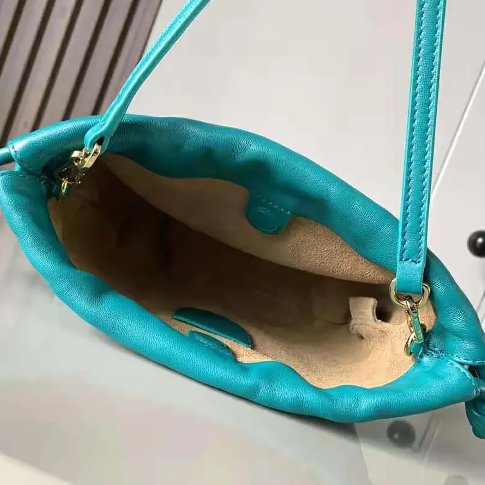 Loewe Mini Flamenco Purse Bag in Mellow Nappa Lambskin for Women in Emerald Green Loewe Mini Flamenco Purse Bag in Mellow Nappa Lambskin for Women in Emerald Green