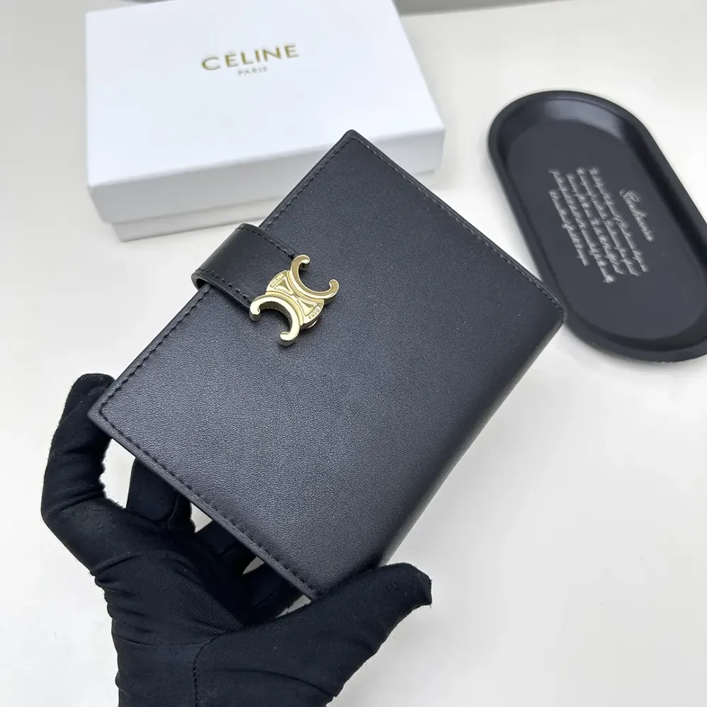 Celine Medium Strap Wallet Nino in Supple Grained Calfskin for Women in Black Celine Medium Strap Wallet Nino in Supple Grained Calfskin for Women in Black